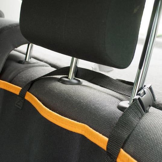 Close up of fastening on the RAC Rear Car Seat Cover For Dogs in use on the back seats of a car
